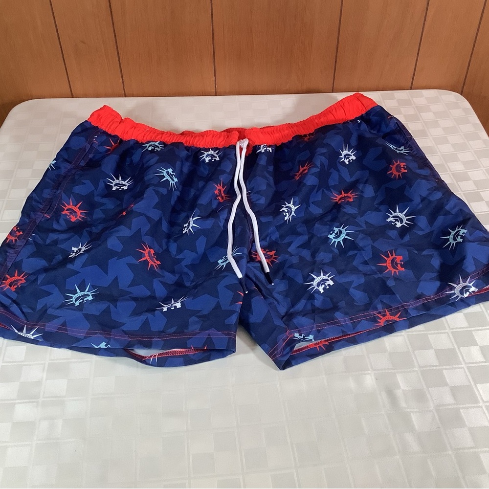Vibrant Blue and Red Swim Trunks with Playful Design